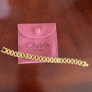Brand new, never worn gold plated OMA bracelet